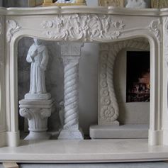 Caminetto artistico in marmo marfil intagliato a mano