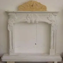 Delicate cream marble fireplace