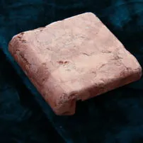 L-shaped element of Rosso Asiago Tumbled 10x10x3x1