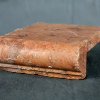 Element for covering stairs or windowsills in antique marble