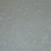 Bush-hammered Botticino marble
