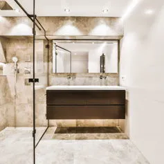 Breccia Paradiso marble bathroom in light tones