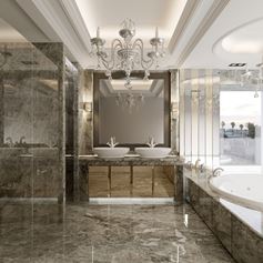 Bagno moderno in marmo Emperador light con ampia vasca da bagno