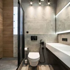 Grey marble bathroom with white agglomerate top