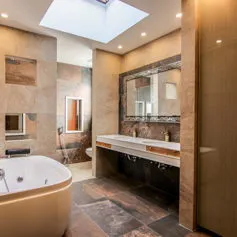 Marble bathroom, a masterpiece of design and craftsmanship, is an ode to warm and enveloping tones