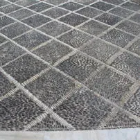 Ciottoli burattati di marmo Nero Ebanino