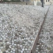 Cobblestones laid on a road