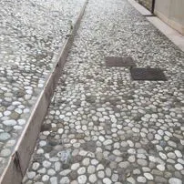 Cobblestones laid on a road