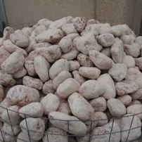 Tumbled pebbles of Rosso Asiago marble
