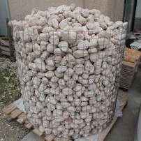 Tumbled pebbles of Rosso Asiago marble