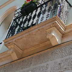 Balconies with marble modillions